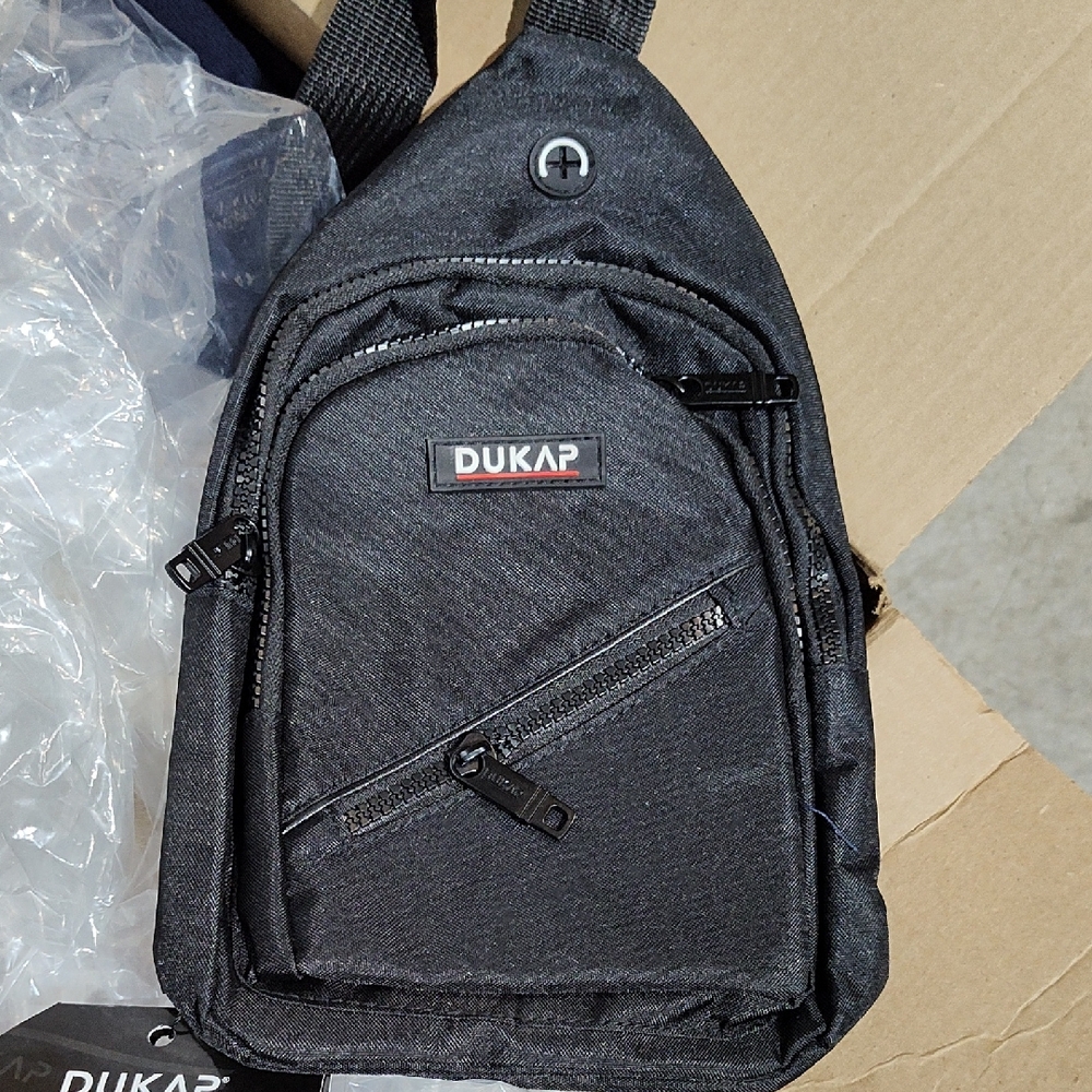 Dukap Beekle,Black Sling Bag, New With Tags